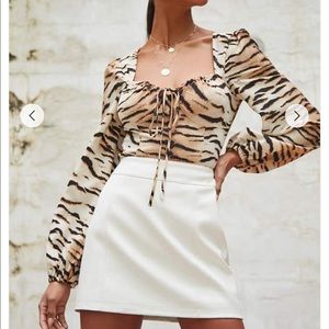 White leather mini skirt